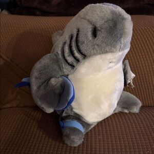 Sharka grey plush toy from artist Desmond Dano